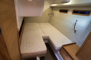 Guest Cabin Comfort Cozy guest cabin with comfortable berths, ensuring a good night's rest on 'Baby Blue'.