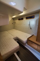 Cozy Sleeping Quarters Additional guest accommodation maximizing the capacity of the Adriana 44 Fly.