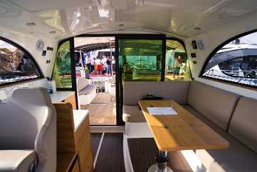 Indoor Dining Area Spacious seating around the salon table, perfect for dining or socializing inside.