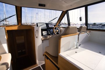 Interior Helm Station - Adriana 44 Fly Comfortable lower helm position offering great visibility and protection from the elements.
