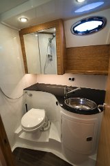 En-suite Bathroom Clean and functional head compartment.