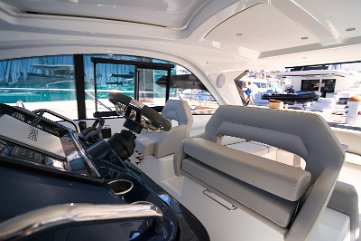 Co-pilot Seating Area Double bench seat at the helm allows guests to join the captain during navigation.