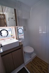 Bathroom with Separate Shower Sealine C390 Well-appointed bathroom on 'Tireless' featuring a separate glass-enclosed shower stall for maximum comfort.