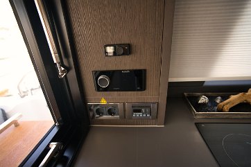 Entertainment & Controls Fusion audio system and control panel within easy reach in the salon of 