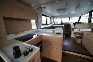 Spazio di lavoro e design della cucina Ampio piano di lavoro e stivaggio nella cucina di 'Swift Home' rendono cucinare un piacere.