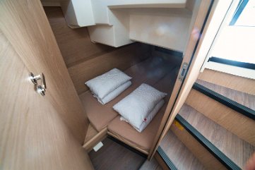Guest Cabin Bunk Beds - Motor Yacht Trawler 41 Starboard guest cabin featuring comfortable bunk beds, ideal for children or crew on 'Swift Home'.