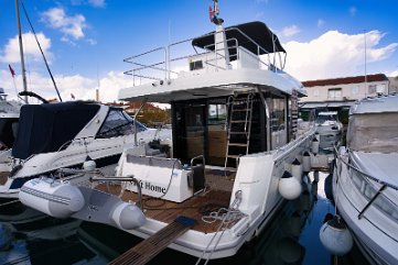 Sliding Glass Entrance Doors Wide glass doors open up the interior to the aft deck, merging indoor and outdoor living.