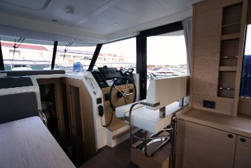 Social Space on Motor Yacht Trawler 41 The open layout connects the helm, galley, and dining area, creating a great atmosphere.
