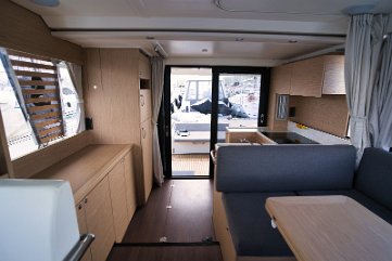 Interior Woodwork & Storage Elegant Alpi wood joinery and plenty of cabinets for storage on this Trawler 41.