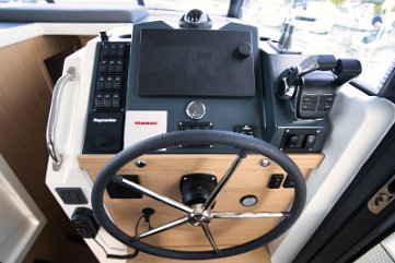 Captain's View - Steering Detail Take command of 'Swift Home' with this traditional yet modern steering wheel and clear dashboard.